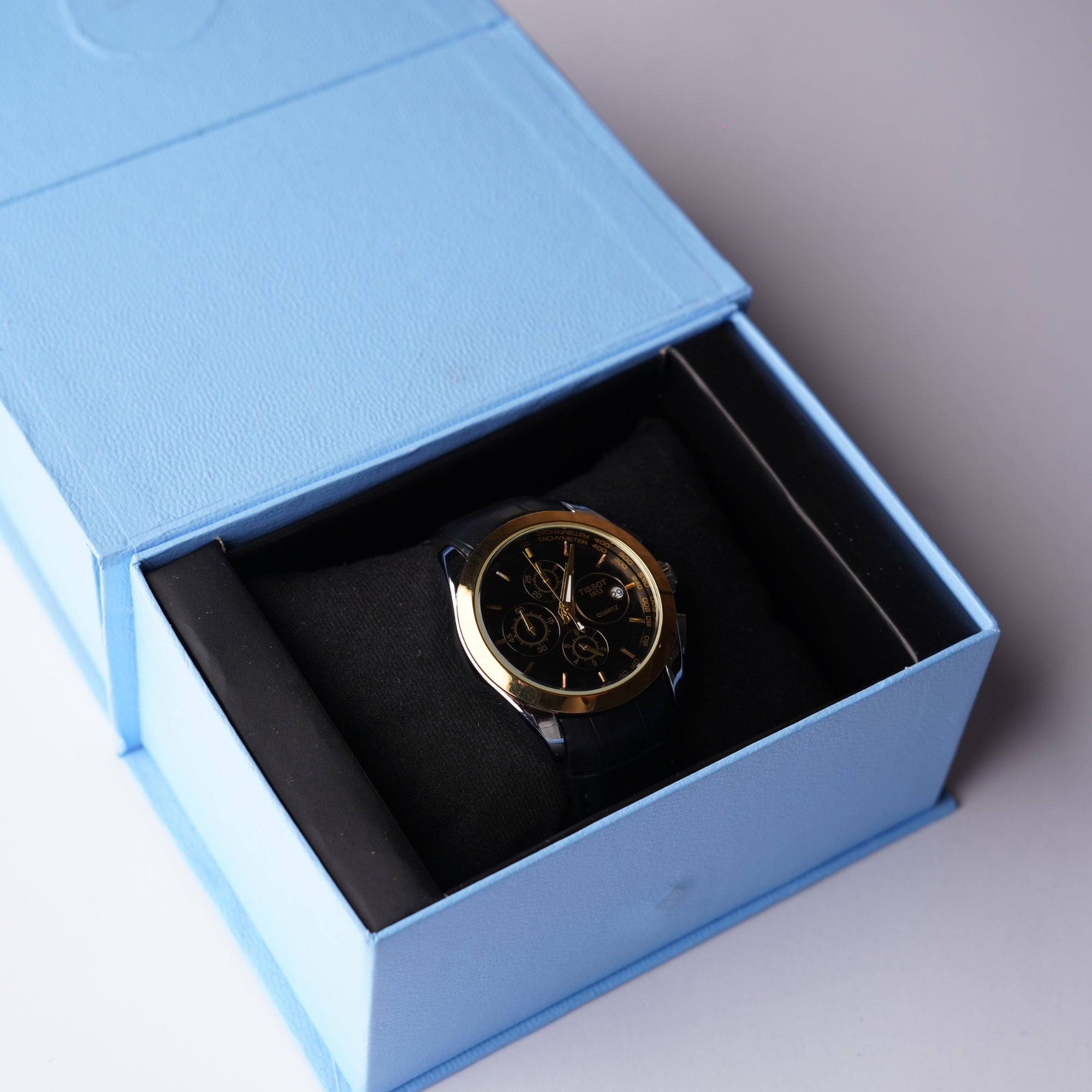 Tissot Powermatic Chronograph – Gold and Black Dial