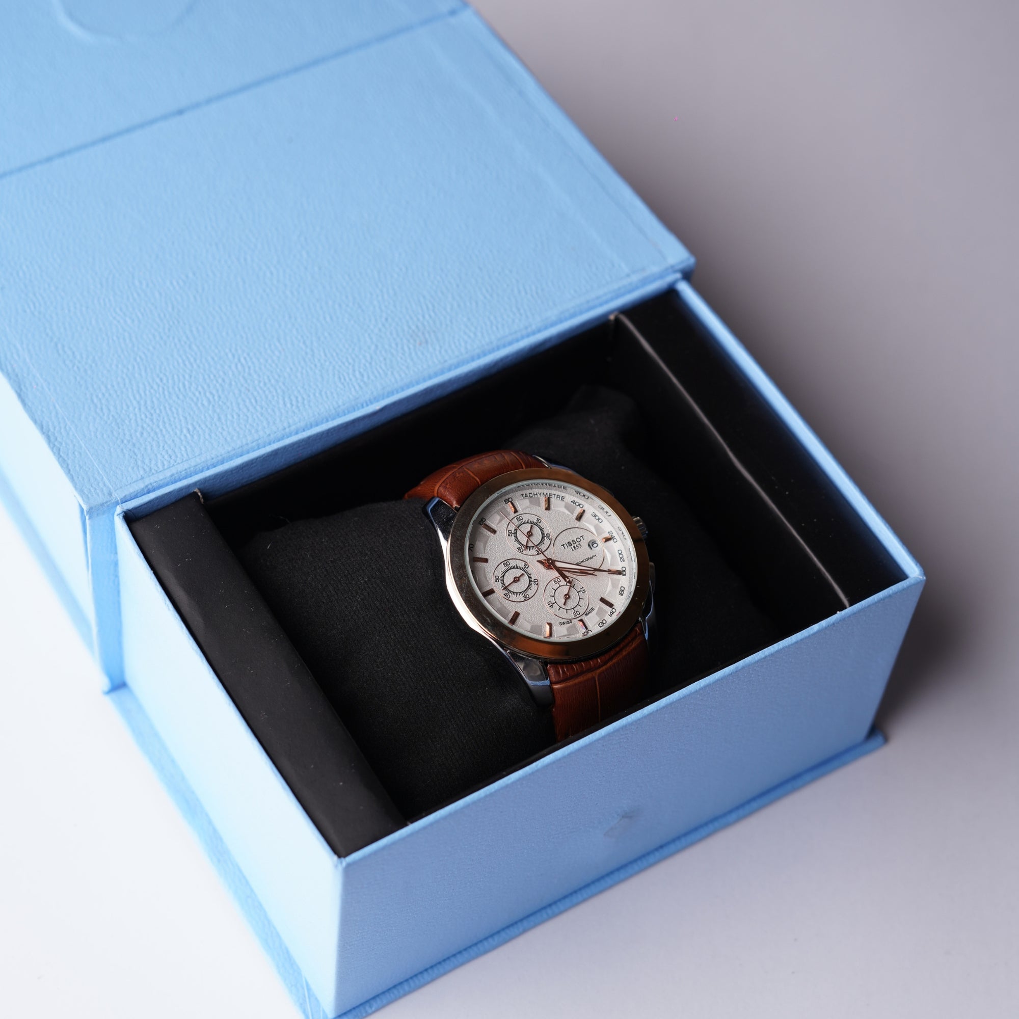 Tissot Powermatic Chronograph – Gold and White Dial